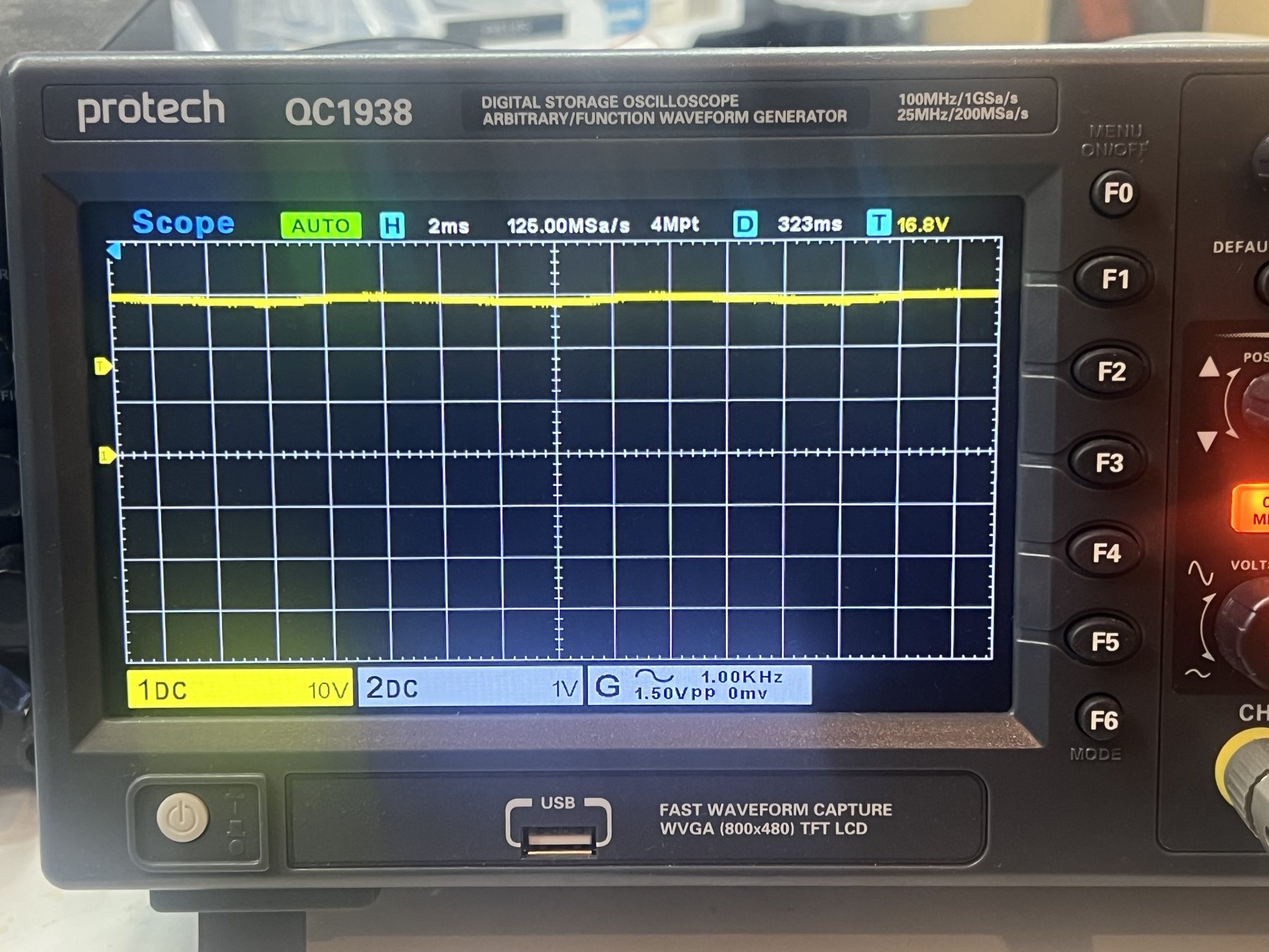 Oscilloscope showing stable DC after capacitor replacement