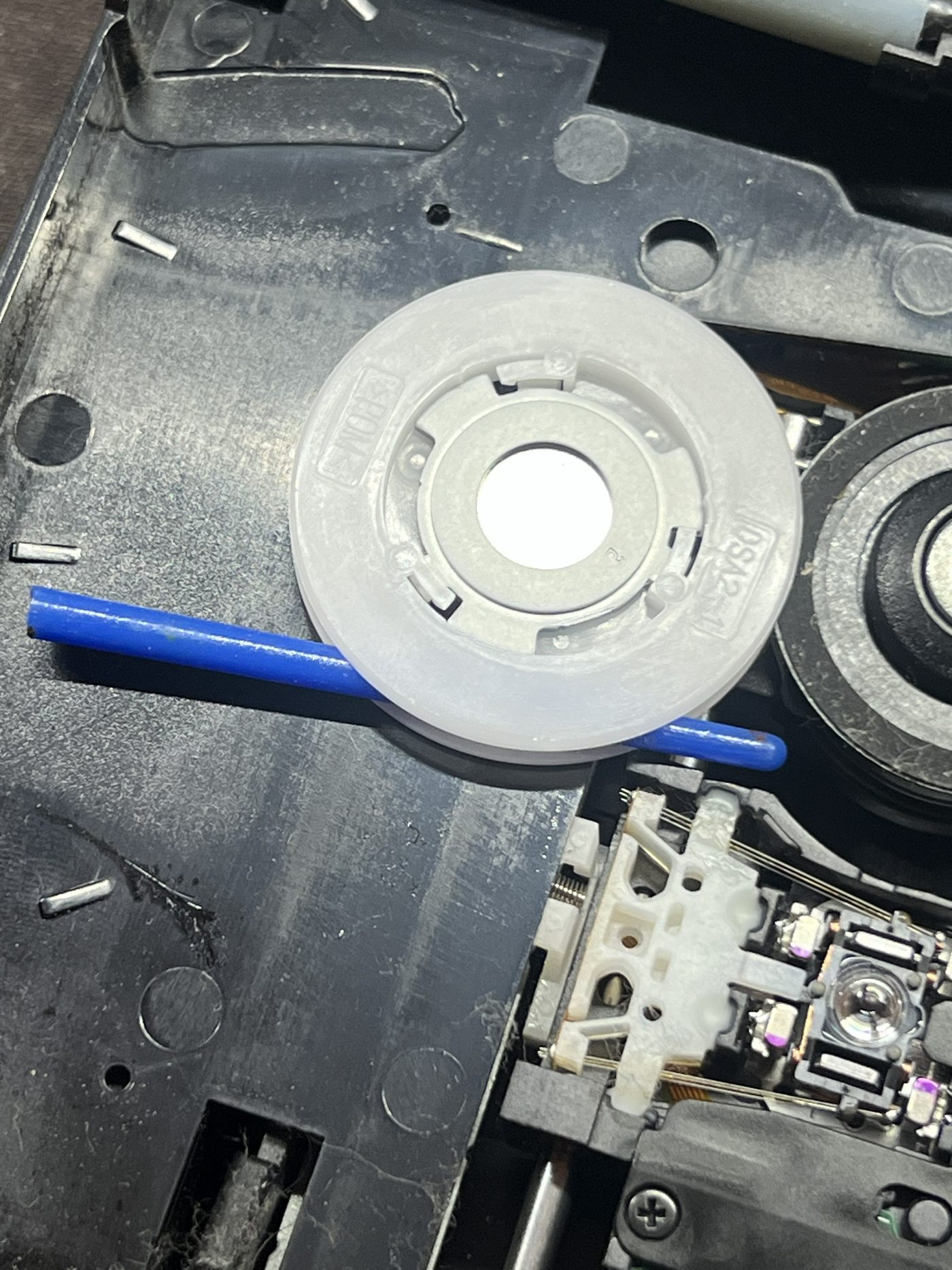 Close view of the foreign object lodged in the PS4 Slim disc drive